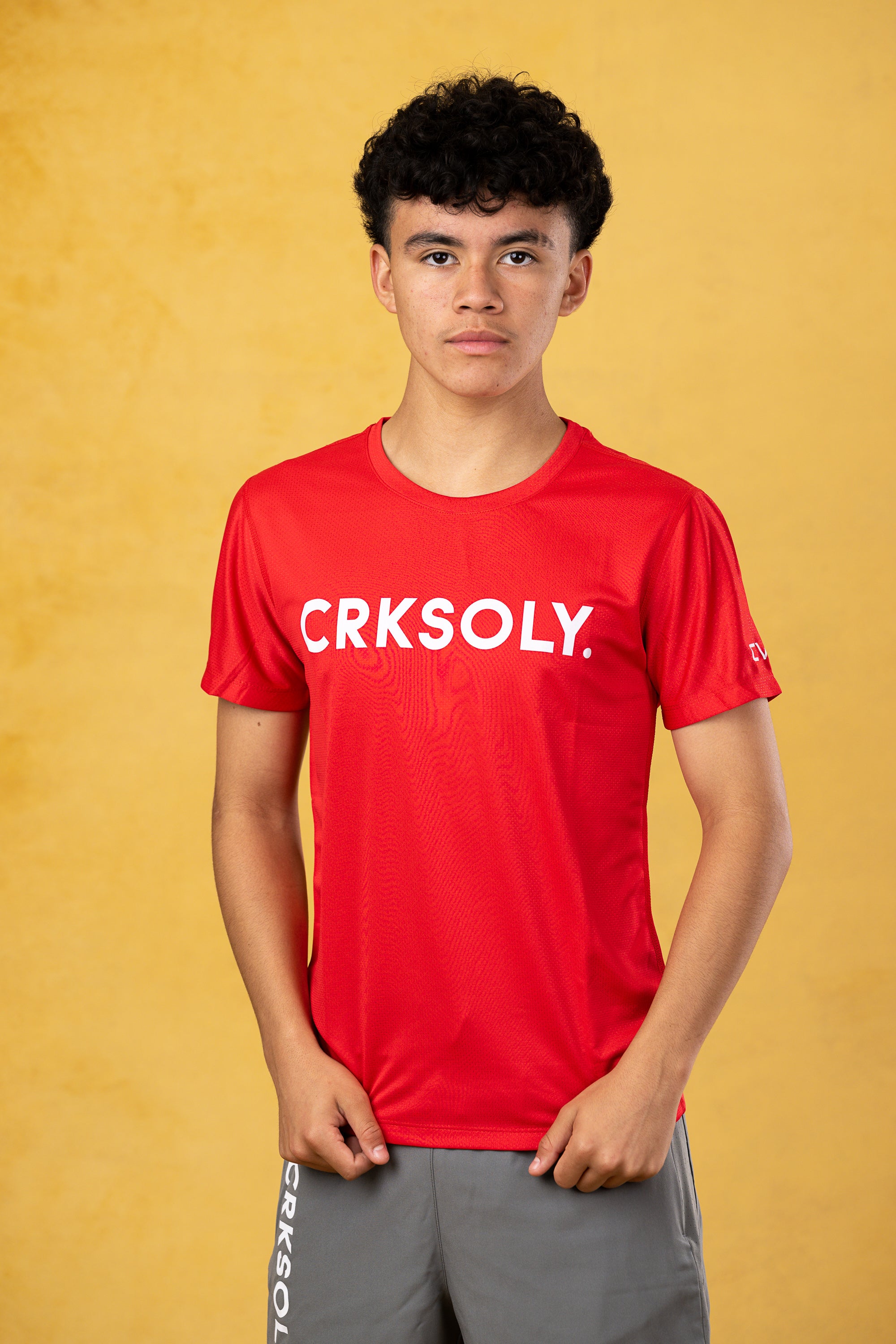 CRKSOLY. Youth Red Training Top, product photo 1