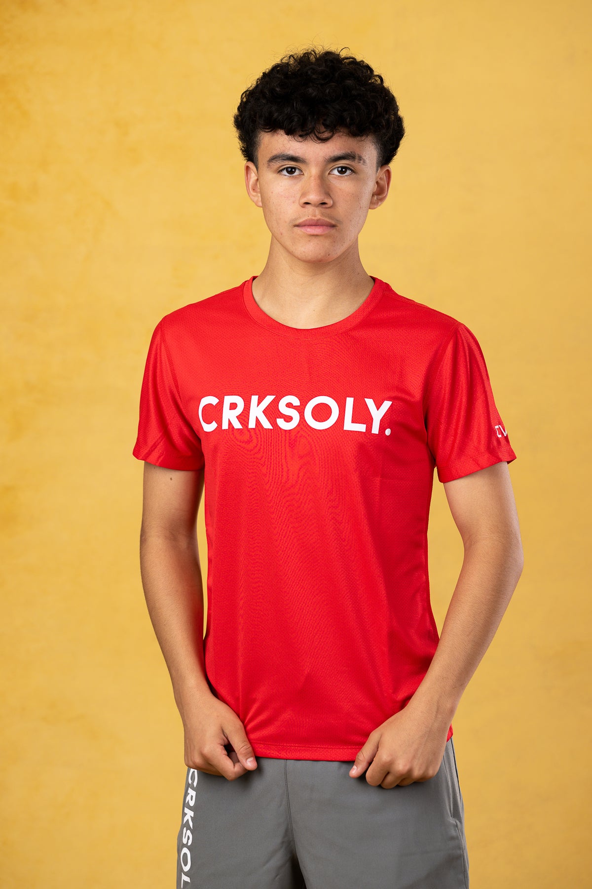 CRKSOLY. Youth Red Training Top, product photo 1