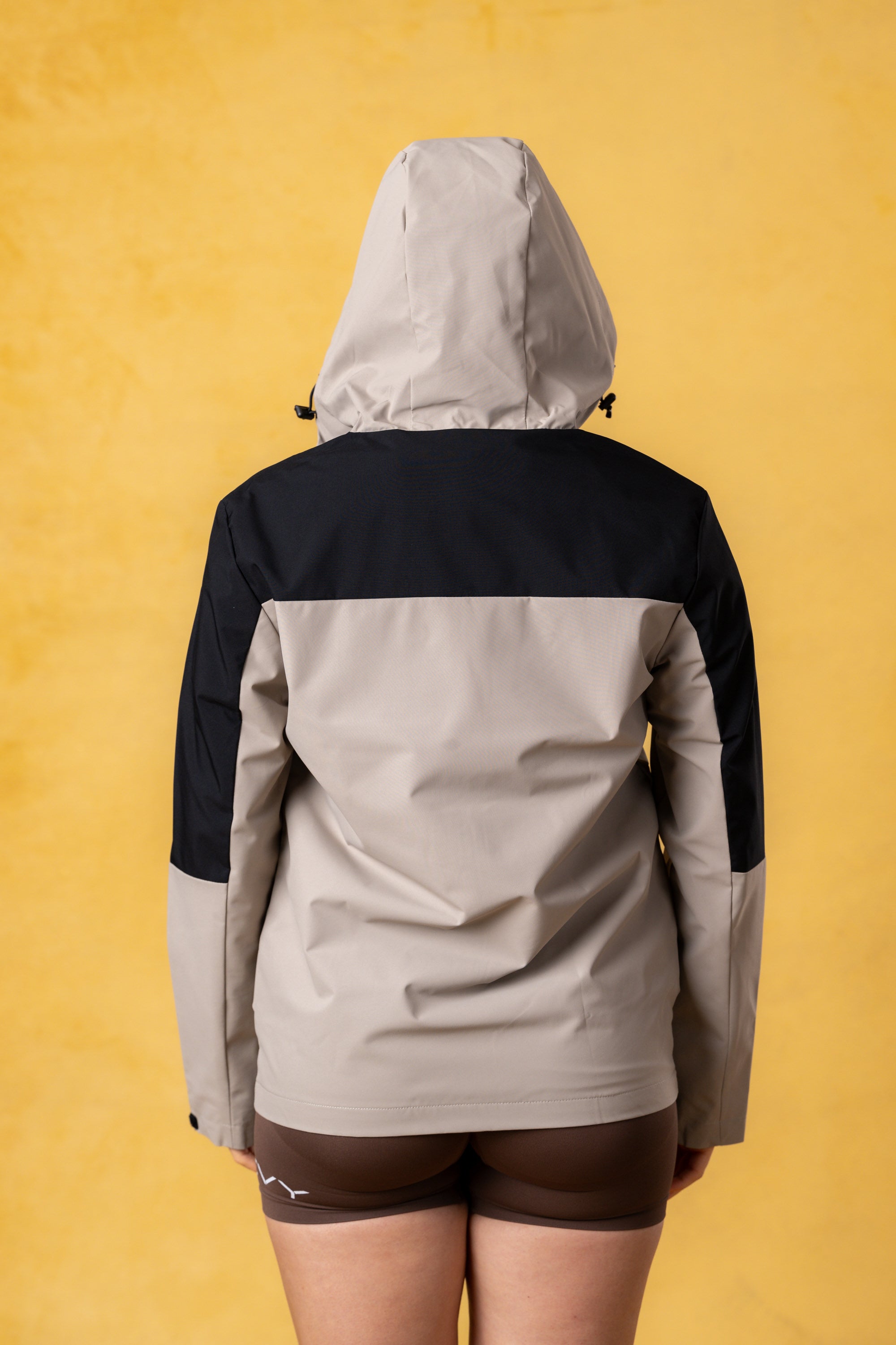 CRKSOLY. Chaqueta cortavientos color canela