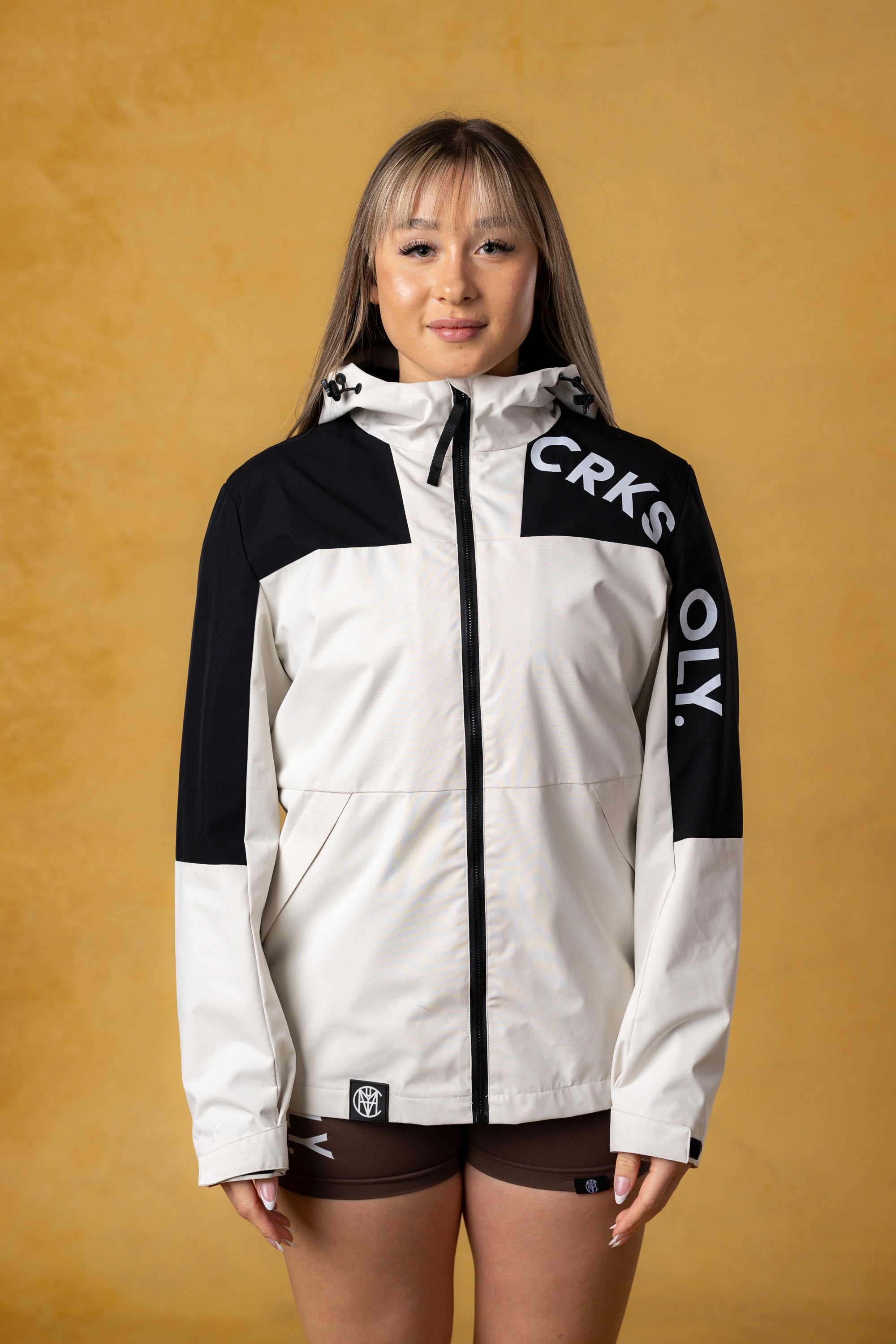 CRKSOLY. Chaqueta cortavientos color canela