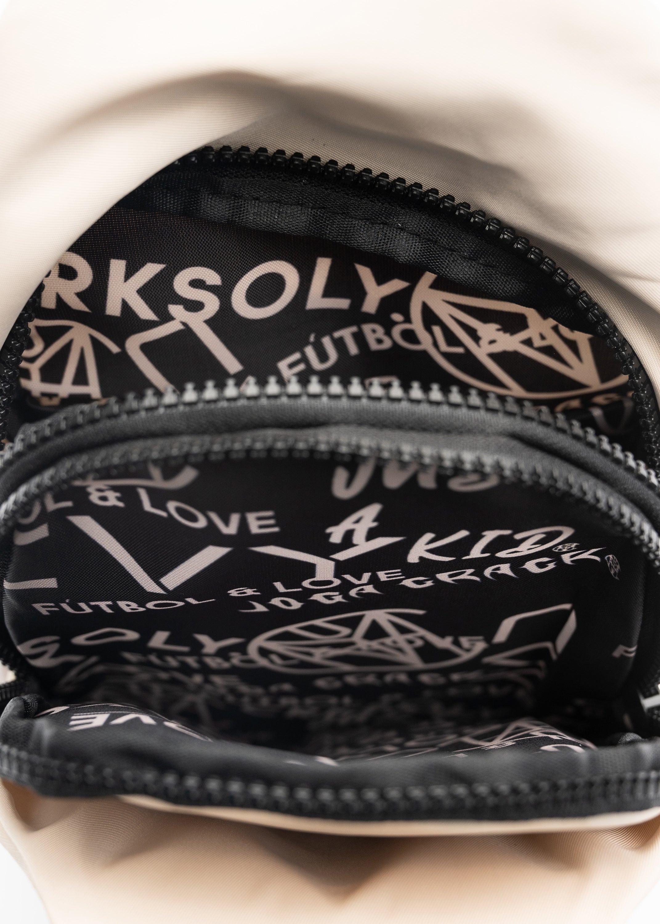 CRKSOLY. Sand Crossbody Backpack