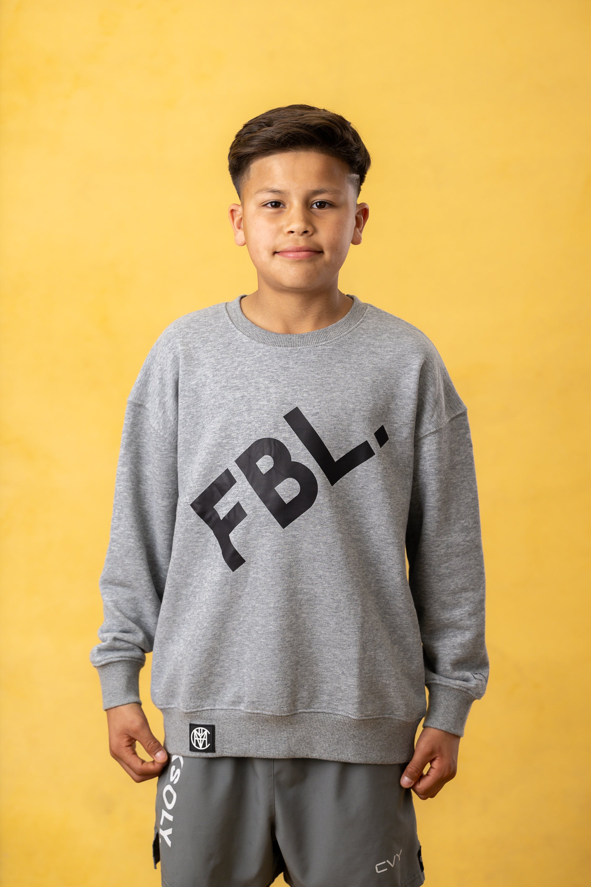 FBL. Jersey de cuello redondo gris jaspeado para jóvenes