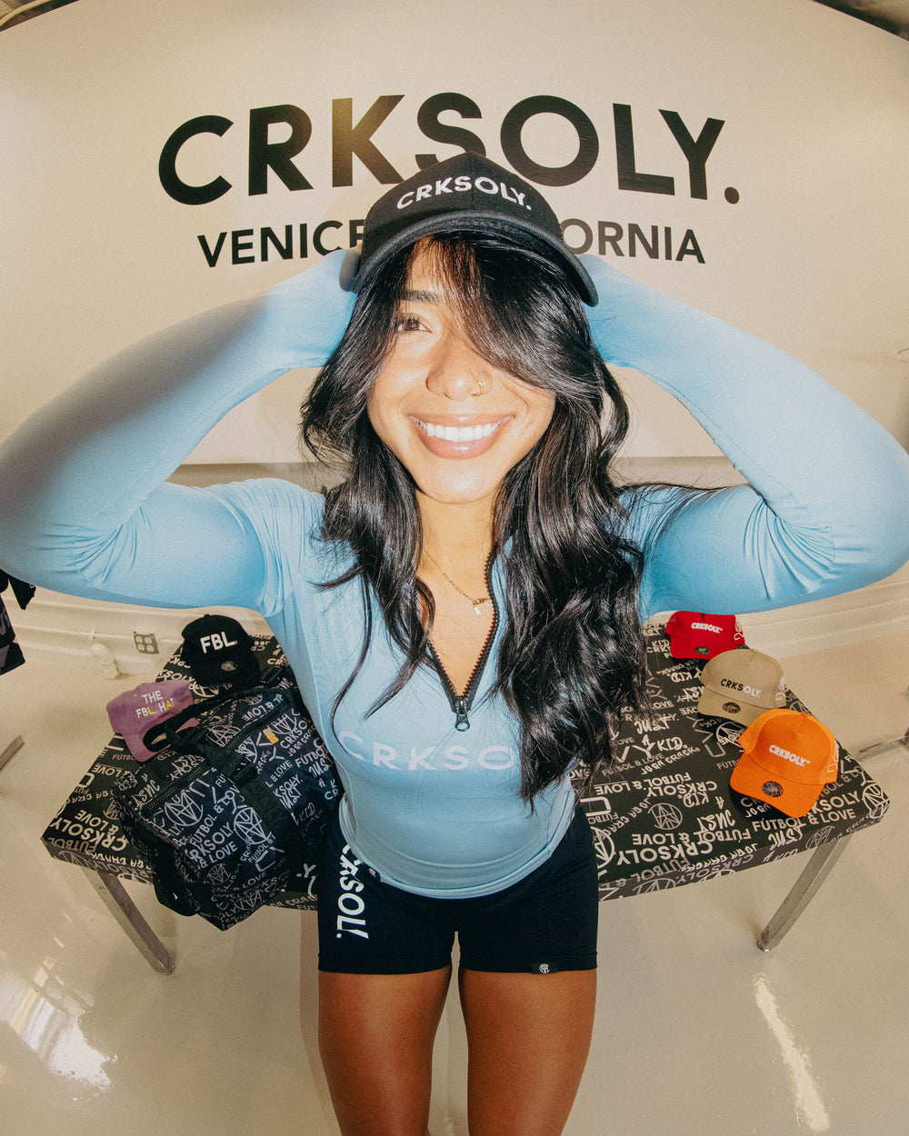 Athlete in a CRKSOLY. cap at the Venice HQ
