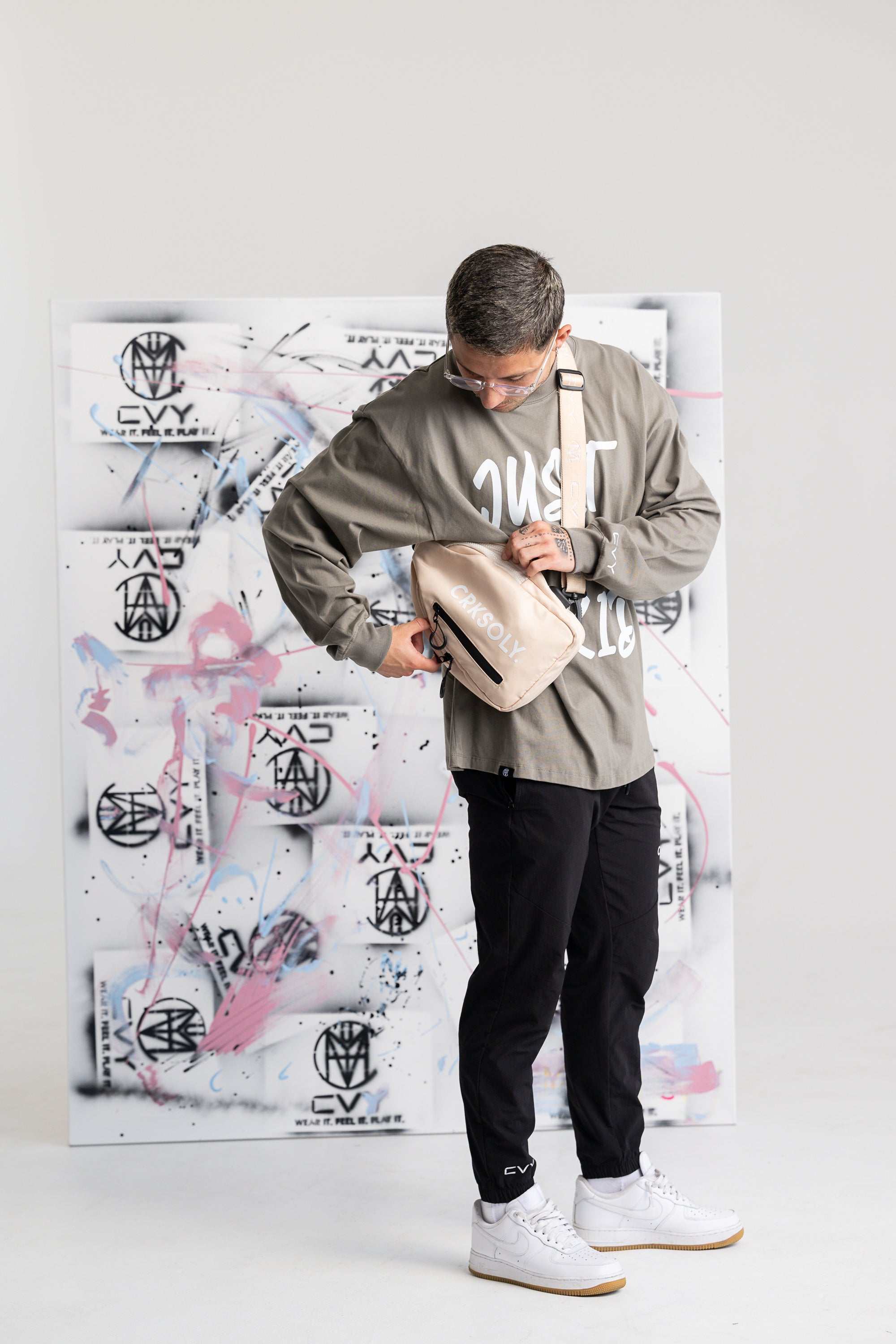 CRKSOLY. Sand Crossbody Backpack