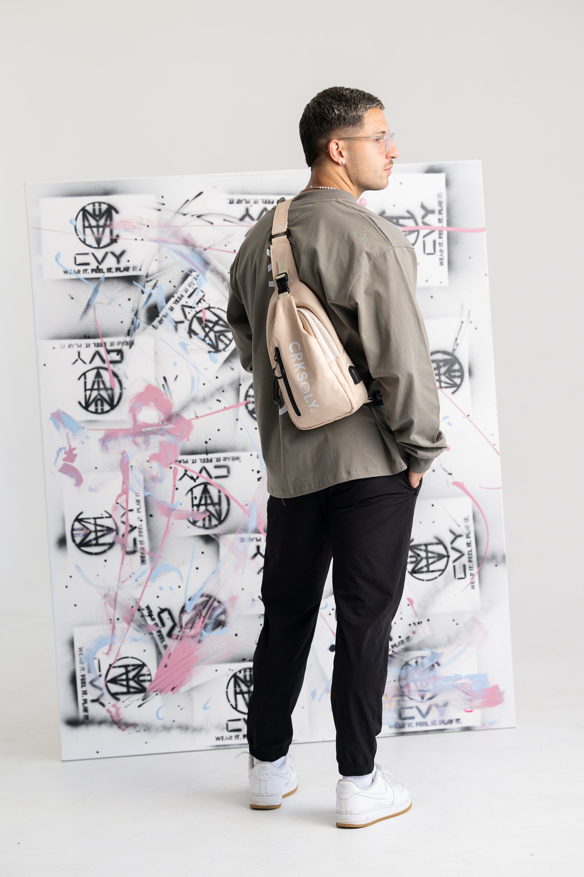CRKSOLY. Sand Crossbody Backpack