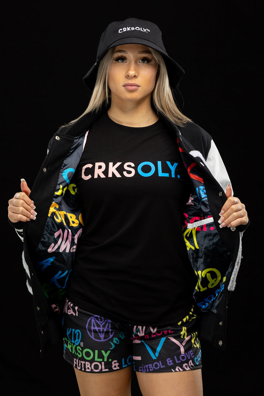 CVY athlete in a CRKSOLY. tee, jacket and shorts