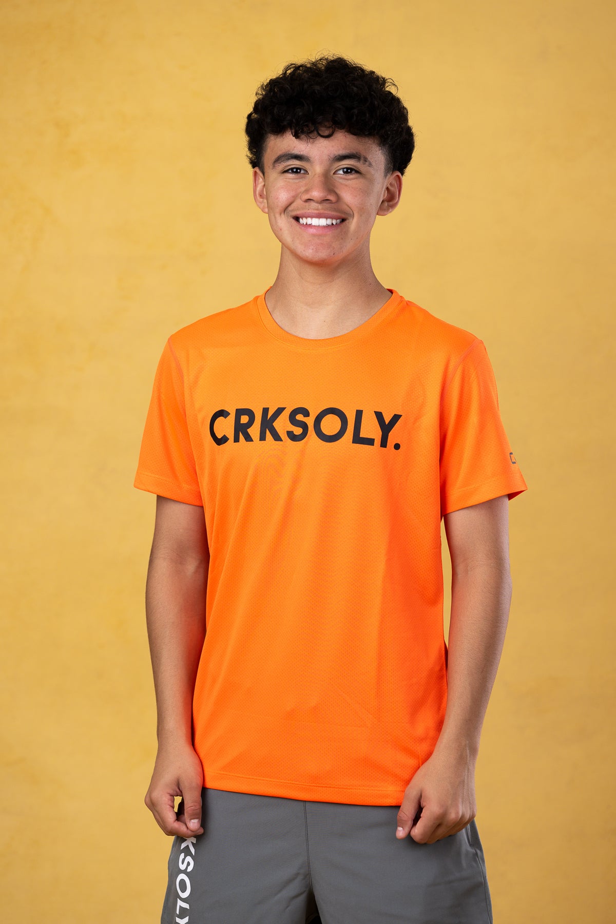 CRKSOLY. Youth Orange Training Top, product photo 1